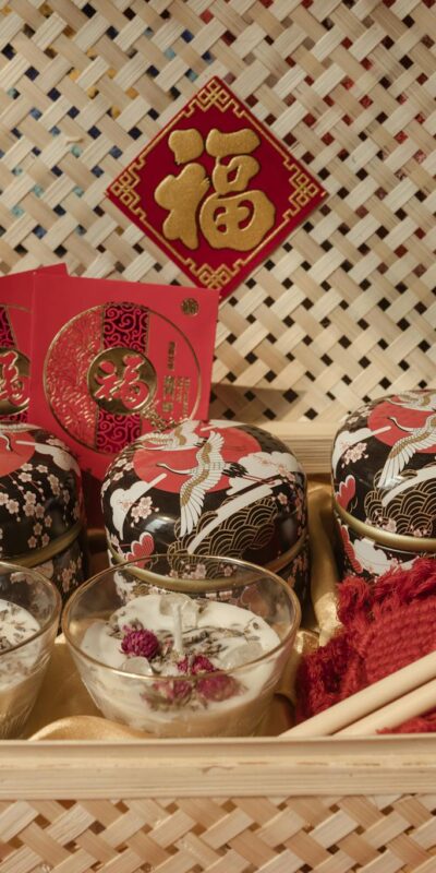 A vibrant display of a traditional Tet gift basket with food and ornaments, perfect for cultural celebrations.