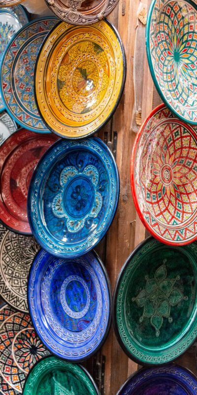 Vibrant display of ornate ceramic plates showcasing traditional craftsmanship.